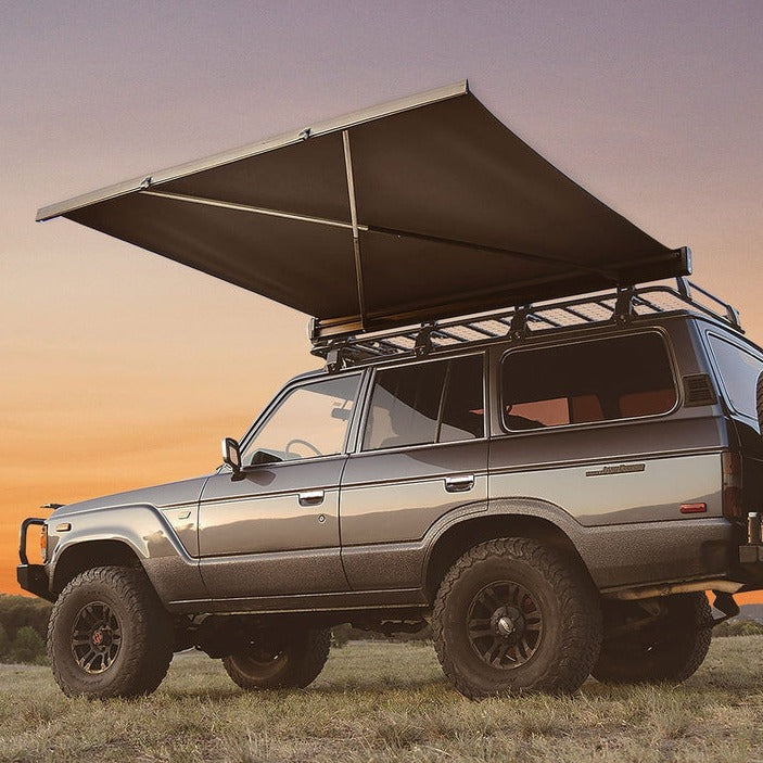 truck with awning on roof rack