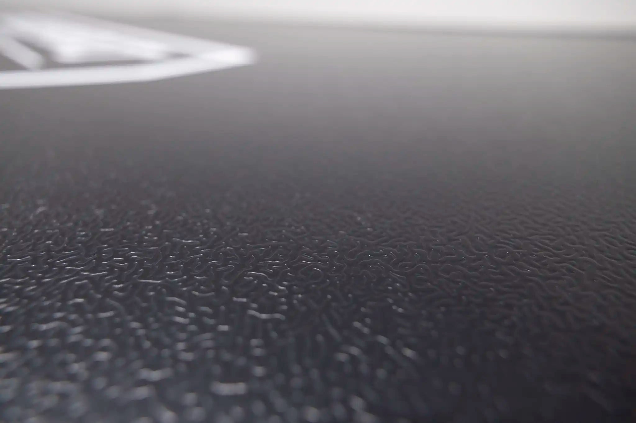 Close-up of a textured black surface