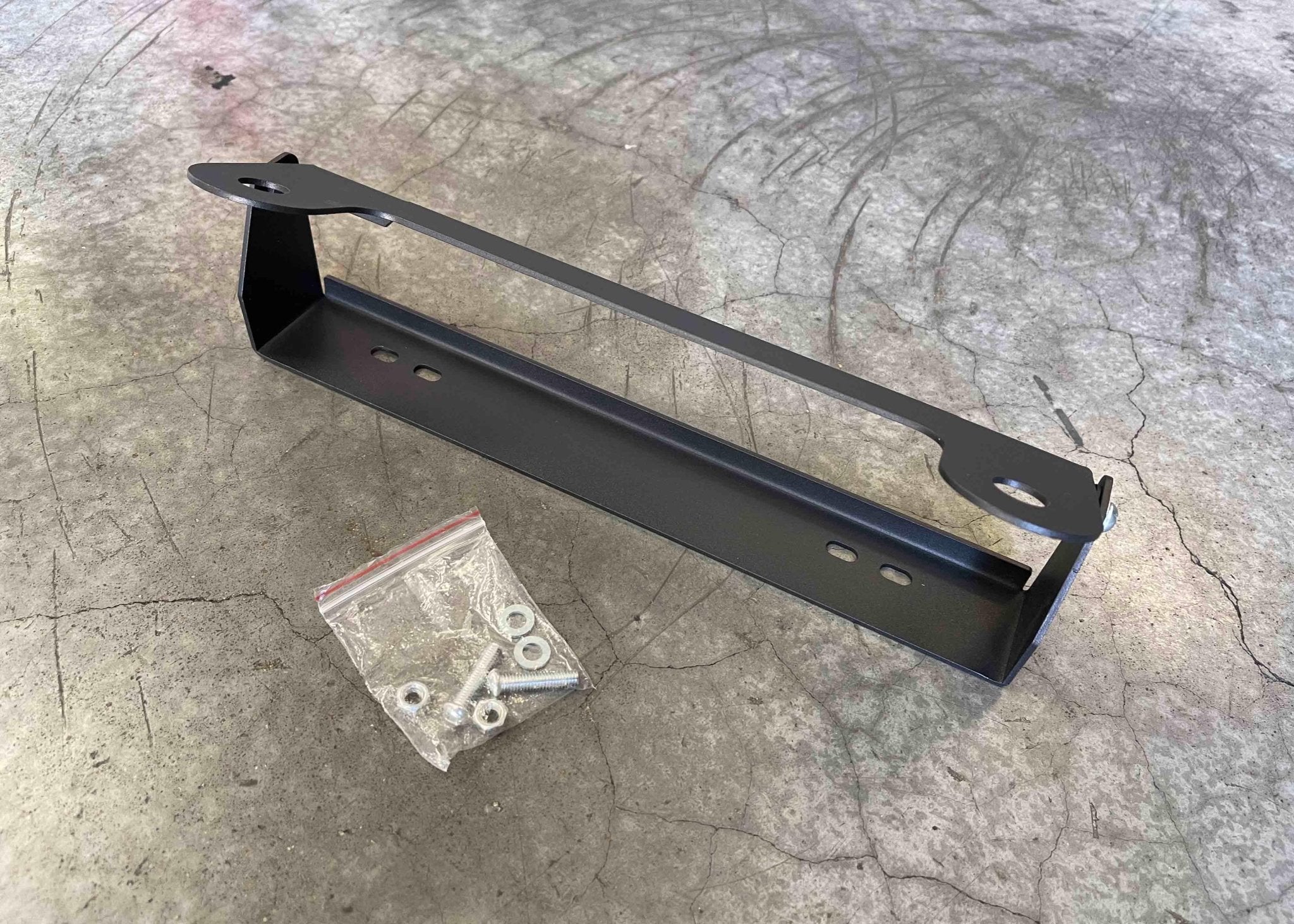 Flip Up Front License Plate Holder - Hawse Fairlead - Spirit of 1876 - Backwoods Adventure Mods