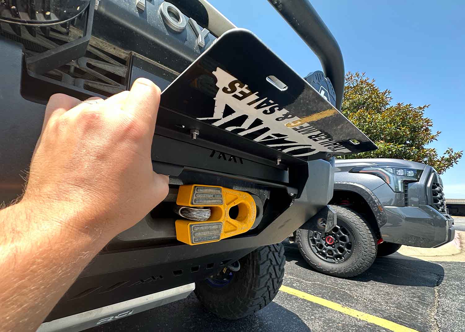 Flip Up Front License Plate Holder - Hawse Fairlead - Spirit of 1876 - Backwoods Adventure Mods
