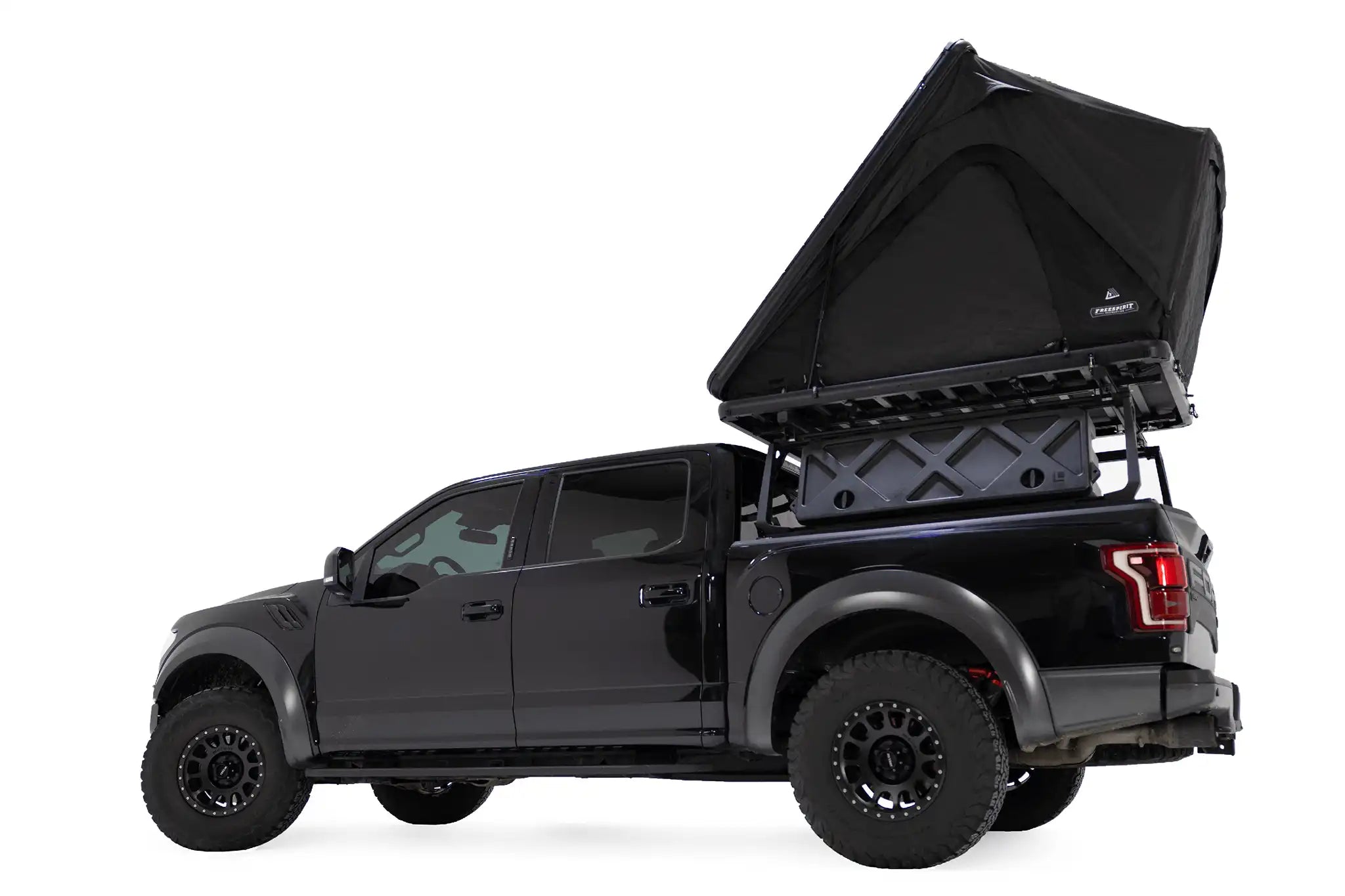 Black pickup truck with an open cargo bed on a white background
