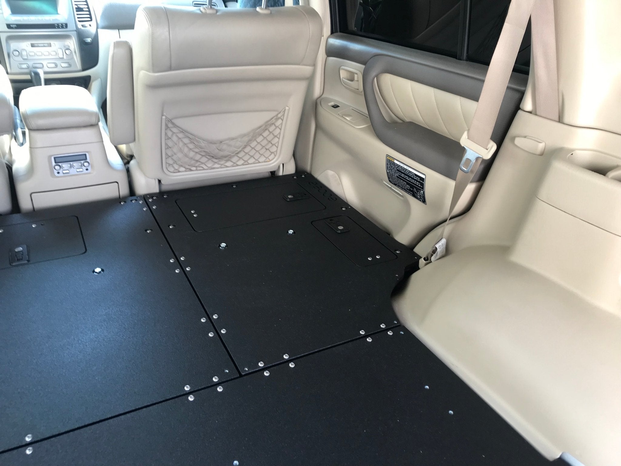 Toyota Land Cruiser 1998 - 2007 100 Series - Second Row Seat Delete Plate System - Spirit of 1876 - Goose Gear