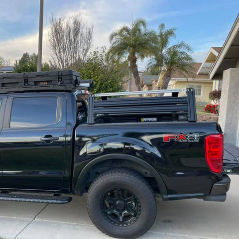 Ford Ranger with extrusion bed rack and Roam boxes.
