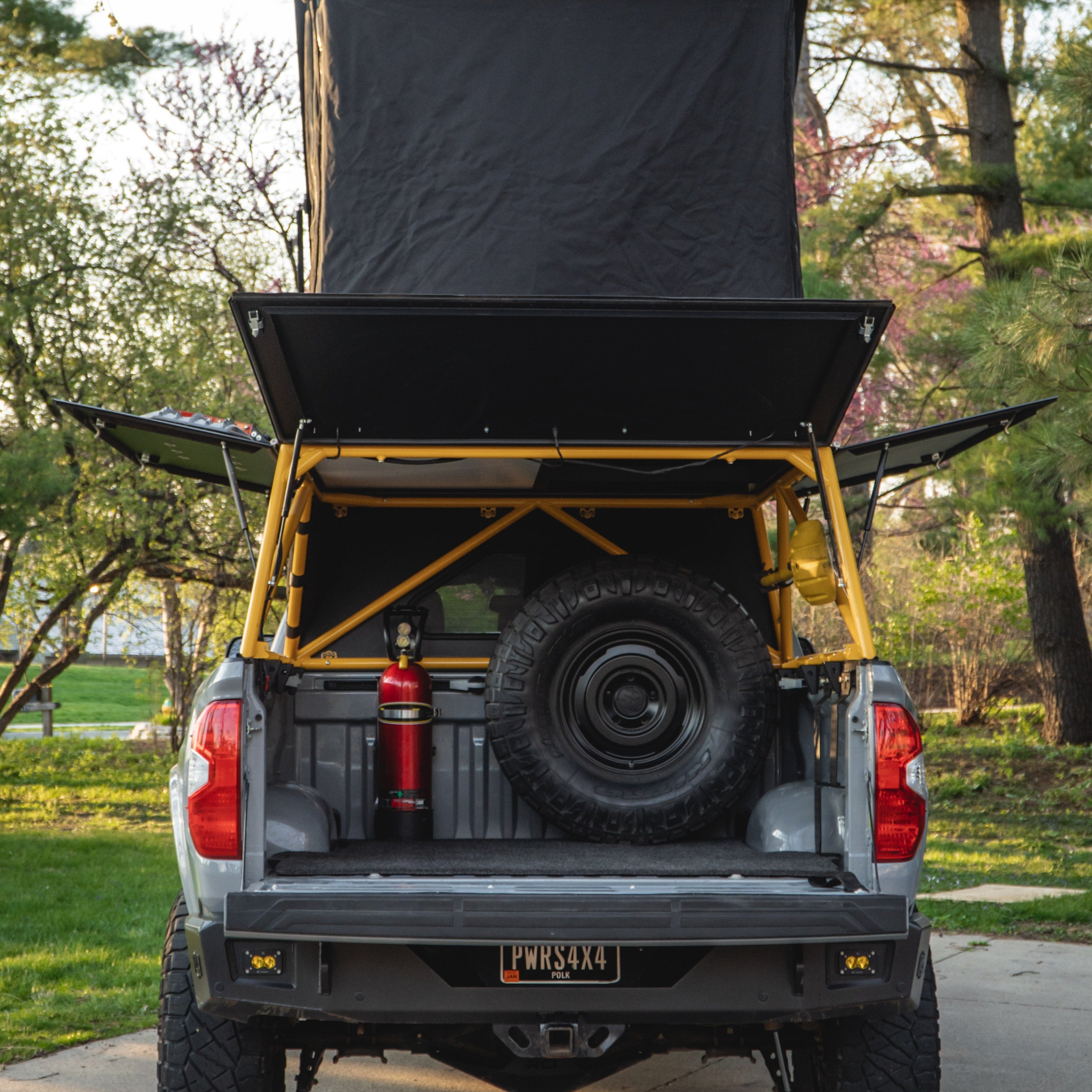 Spare tire carrier for tacoma or tundra in bed of truck
