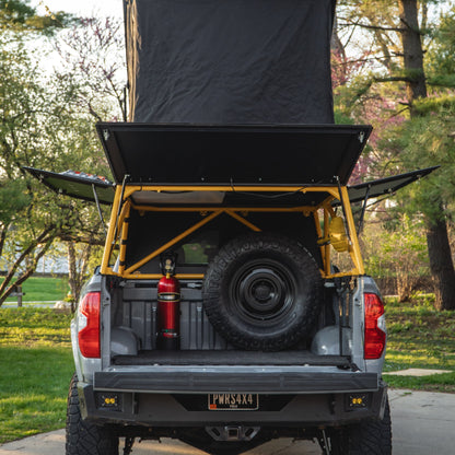 Spare tire carrier for tacoma or tundra in bed of truck